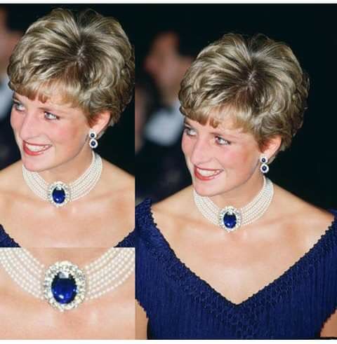 the princess is wearing an elaborate necklace and earrings with pearls on it's neck