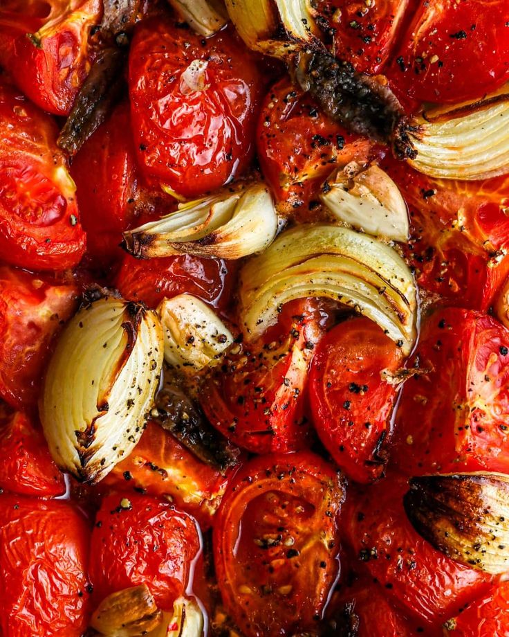 roasted tomatoes and onions with spices on top