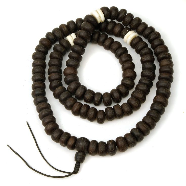 Bodhi Seed XL Mala with Sacred Shank Shell Spacers Approx. 36" long Bead Approx. 14mm x 8mm Strung on cotton cord Natural Bodhi beads custom ground down by hand to flat edges so that the beads lay very clean like rondelles. This is a special skill used on Rudraksha beads and Bodhi beads alike and was developed Bead Artists/ Mala Artists in Nepal. Traditional Adjustable Mala With Large Beads, Traditional Adjustable Single Strand Beaded Necklaces, Traditional Adjustable Single Strand Beaded Necklace, Rudraksha Beads, Bead Art, Seeds, Shells, Beaded Necklace, Beads