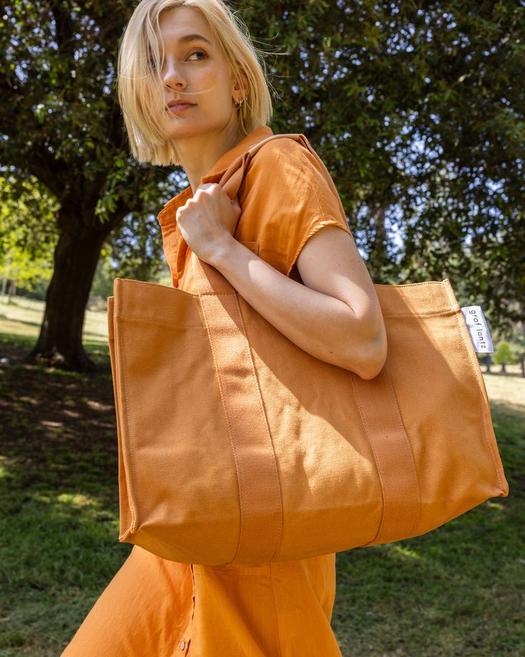 Sometimes you need a big cotton tote. For beach days, or pool days, or picnics, or last minute getaways, or shopping trips around town. Ours is of sturdy heavy cotton, with thick webbing handles, just like you, it gets the job done and looks flawless doing it. The flat bottom allows for easy packing and a magnetic closure makes getting in and out of it easy. So stack storage containers full of snacks, or fill with fresh towels ready for after that refreshing dip. Pair with the matching pouch for Wine Carrier Bag, Fresh Towels, Wine Markers, Wine Carrier, Easy Packing, Pool Days, Carrier Bag, Accessory Pouch, Beach Days