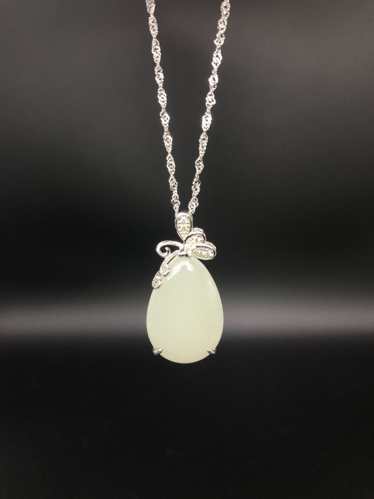 "Certified White Jade necklace butterfly decor The jade has been one of the most valued gems in large cultures. White Jade, also known as a type of \"He Tian\" Jades, was first found about 8,000 years ago. Its bright and soft color make this stone one of the most wanted by sculptors. In the Chinese civilization, jade is considered an imperial gem and she is favored by the Empresses, not just as an expression of their nobility, but also femininity.  Jade is also recognized as a type of mineral, known as Nephrite. Suitable for various occasions. What you will received: - A White Jade Pendant - The Exclusive Certificate of that white jade (Each jade has its own certificate) - A Matching necklace - A Gift box (The color will be selected at our own discretion if neither option is requested) - A Exquisite Jade Necklace Gift, Exquisite Jade Necklaces For Gifts, Exquisite Jade Necklace For Gift, Formal Fine Jewelry Jade Necklace, Fine Jewelry Jade Pendant Necklace, Elegant Jade Necklace For Formal Occasions, Elegant Jade Gemstone Necklaces, Elegant Jade Necklace With Gemstone, Formal Jade Necklace With Round Pendant