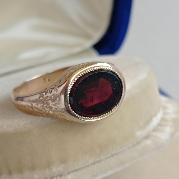 Vintage Gold and Garnet Signet Ring - 14K Gold With a 14K gold Hungarian hallmark that was used from 1966. This ring is in very good condition. The head of the ring is 0.45 inches (11.63 mm) long and 0.57 inches (14.64 mm) wide. Size of the stone: 0.34 inches (8.78 mm) long and 0.45 inches (11.5 mm) wide Inside diameter: 0.83 inches (21.17 mm) Size: USA 11.5-12 UK W 1/2 -X1/2 EU 66-67 Weight: 7 grams The box is not part of the auction. Free world-wide shipping by FedEx. Amethyst Signet Ring, Garnet Ring Vintage, Garnet Ring, Signet Rings, Garnet Rings, Ring Vintage, Signet Ring, Hungary, Vintage Gold