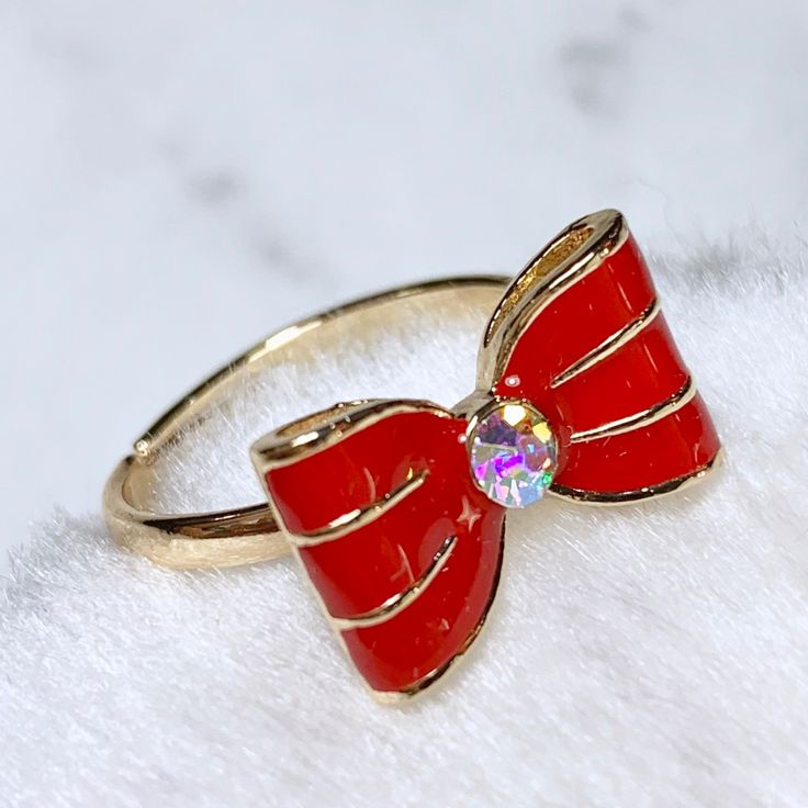 Brand New Gold Tone Bow Ring In Red. Adjustable Size. Trendy Red Party Rings, Cute Red Round Jewelry, Cute Round Red Jewelry, Cute Adjustable Rings For Parties, Cute Adjustable Party Rings, Adjustable Cute Party Rings, Cute Red Ring As Gift, Cute Red Ring For Gift, Christmas Rings