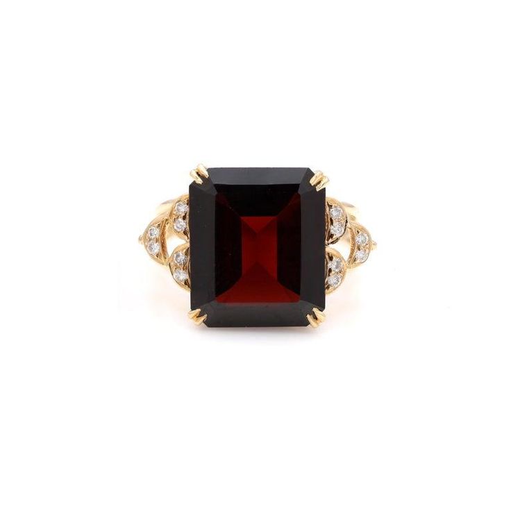 This is part of Chairish’s Fine Jewelry assortment.  Garnet Diamond Cocktail Ring in 14K Gold featuring natural garnet of 10.7 carats and diamonds of 0.1 carats. The gorgeous handcrafted ring goes with every style. Garnet helps with love and relationships because its red color symbolizes a strong love or romantic connection.  Designed with octagon cut garnet as center stone with diamonds studded on side making a beautiful design that makes it a perfect fit to wear it on your wedding or style it Luxury Ruby Ring With Diamond Accents, Luxury Ruby Rings With Gemstone Accents, Elegant Diamond Ring With Gemstone Accents For Gift, Formal Garnet Ring With Center Stone, Luxury Red Ruby Ring With Gemstone Accents, Luxury Ruby Ring With Gemstone Accents For Anniversary, Formal Garnet Rings With Accent Stones, Luxury Red Birthstone Ring With Gemstone, Formal Garnet Rings Fine Jewelry