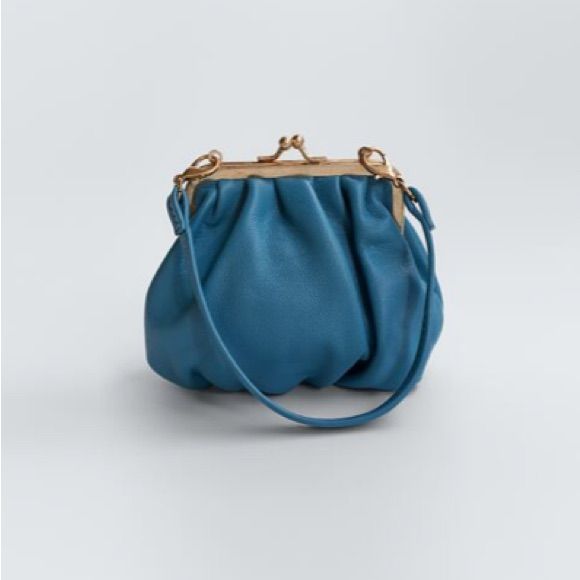 Genuine Zara New With Tag Material: Leather Upper Color: Aqua Blue Vintage Chic! Leather Hand Strap. Chain Strap Not Part Of Bag. Love Love Pretty Blue Color Zara Leather Shoulder Bag, Zara Leather Shoulder Bag For Everyday Use, Zara Shoulder Bag For Everyday Use, Zara Leather Travel Bag, Zara Top Handle Shoulder Bag For Everyday Use, Everyday Leather Zara Satchel, Zara Bucket Bag With Removable Pouch For Everyday, Blue Handheld Bag With Gold-tone Hardware, Zara Bags With Removable Pouch For Everyday Use