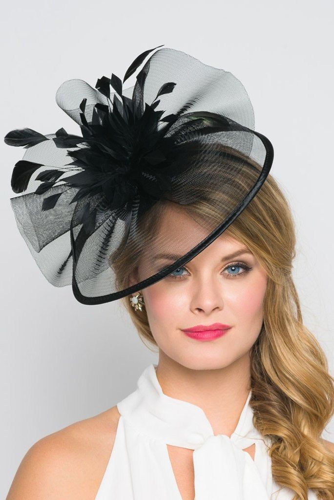 You are a picture of glamorous sophistication when you put on this romantic fascinator! Modern with a vintage touch, this elegant horse hair mesh base adorns a beautiful bouquet of soft feathers. A soft satin trim offers and allure that's simply breathtaking. - Horse hair mesh - Easy wear slip-on headband Fitted Feather Trim Fascinator For Church, Fitted Church Fascinator With Feather Trim, Church Fascinator With Feather Trim, Wedding Fascinator With Feather Trim For Royal Ascot, Tulle Hat For Kentucky Derby Party, Chic Black Wedding Headpiece, Spring Evening Mini Hat With Feathers, Elegant Adjustable Ostrich Feather Fascinator, Evening Fascinator With Feather Trim And Adjustable Fit