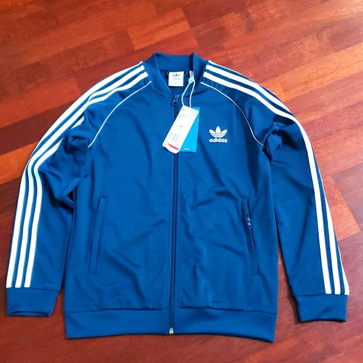 Nwt, Good Condition, Never Use Blue Adidas Track Jacket For Spring, Adidas Blue Track Jacket For Spring, Blue Track Jacket With Ribbed Cuffs For Fall, Blue Spring Sports Outerwear, Blue Adidas Outerwear For Outdoor, Adidas Blue Outdoor Outerwear, Casual Blue Adidas Outerwear, Blue Track Jacket With Ribbed Cuffs For Winter, Blue Winter Track Jacket With Ribbed Cuffs