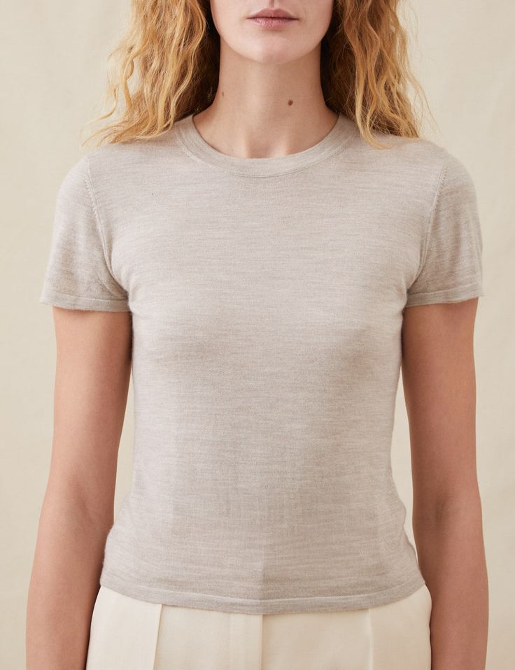 In a luxuriously soft, lightweight cashmere blend, this classic t-shirt has a rounded crew neckline, capped sleeves and a slim fit through the body. Wear it with The Relaxed Pants in Hammered Satin or The Tailored Trousers. Rounded neckline Capped sleeves Dry clean only 35% Cashmere, 35% Wool, 30% Silk Luiza wears a Small Height: 5'9½" (177 cm) | Bust: 33” (84 cm) | Waist: 26” (66cm) | Hips 36” (92cm) Fulfilled by Attersee Relaxed Pants, Silk T Shirt, Capped Sleeves, Rounded Neckline, Tailored Trousers, Dry Clean Only, Round Neckline, Crew Neckline, Cap Sleeves