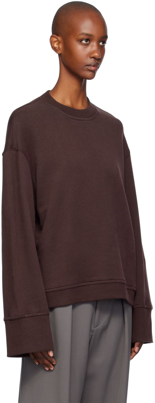 Lightweight French terry sweatshirt. · Rib knit crewneck, hem, and cuffs · Dropped shoulders · Extended sleeves Supplier color: Dark plum