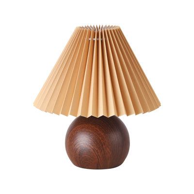 a wooden table lamp on a white background