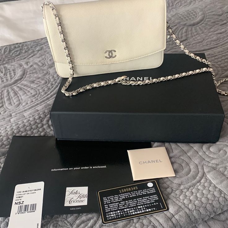 White Chanel Wallet On Chain Silver Hardware Rip In Leather Of Chain Can Be Easily Fixed Staining In Corners And Signs Of Some Wear On Leather Guaranteed Authentic Chance To Buy A Chanel At This Price White Shoulder Bag For Evening With Original Box, Classic White Leather Wallet On Chain, White Leather Classic Wallet On Chain, Luxury White Wallet On Chain, Luxury White Rectangular Wallet On Chain, Chic White Wallet On Chain For Everyday, White Elegant Evening Bag For Travel, Elegant White Evening Bag For Travel, White Luxury Wallet On Chain With Chain Strap