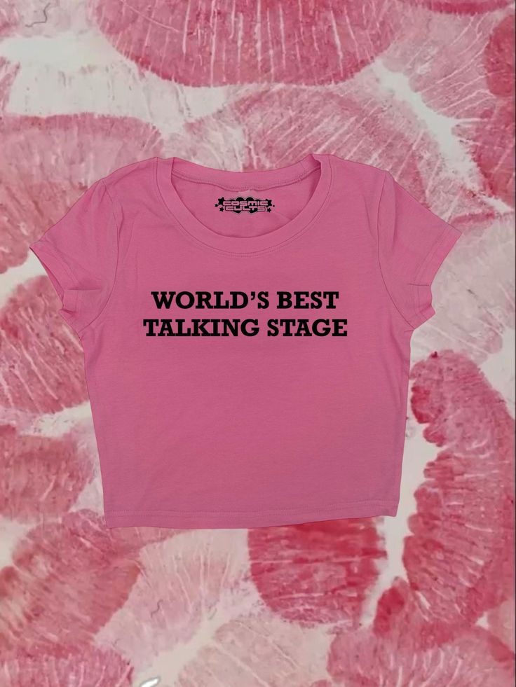 "Crop top with \"Worlds Best Talking Stage\" - design printed on a 95% cotton 5% spandex, form fitting, available in multiple colors 💞 Make sure to check the size chart!✨ Message me with any questions :)  we do not give refunds for incorrect addresses so please double check that all your information is correct before ordering" Trendy Stretch T-shirt With Slogan, Y2k Style Crop Top T-shirt With Text Print, Pink Stretch T-shirt With Text Print, Fitted Basic T-shirt With Funny Print, Pink Letter Print Tops For Streetwear, Pink Tops With Letter Print For Streetwear, Trendy Pink Cropped T-shirt With Letter Print, Fitted Basic T-shirt With Slogan, Pink Y2k T-shirt With Letter Print