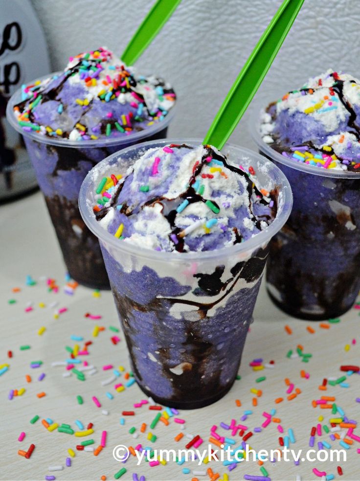 three ice cream sundaes with sprinkles on top