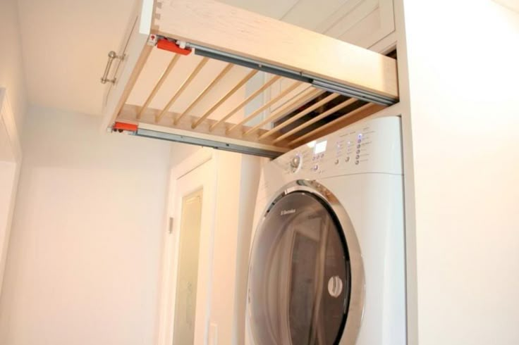 a washer and dryer in a small room