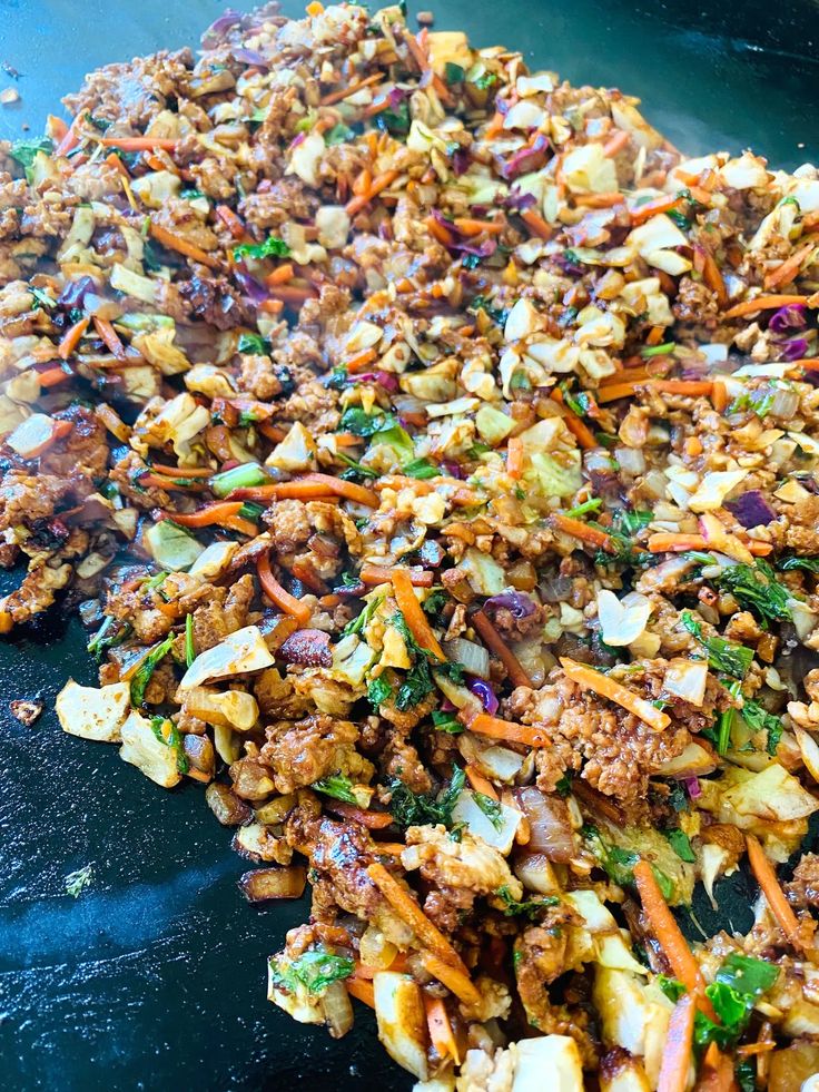 the food is prepared and ready to be eaten on the grilling pan for consumption