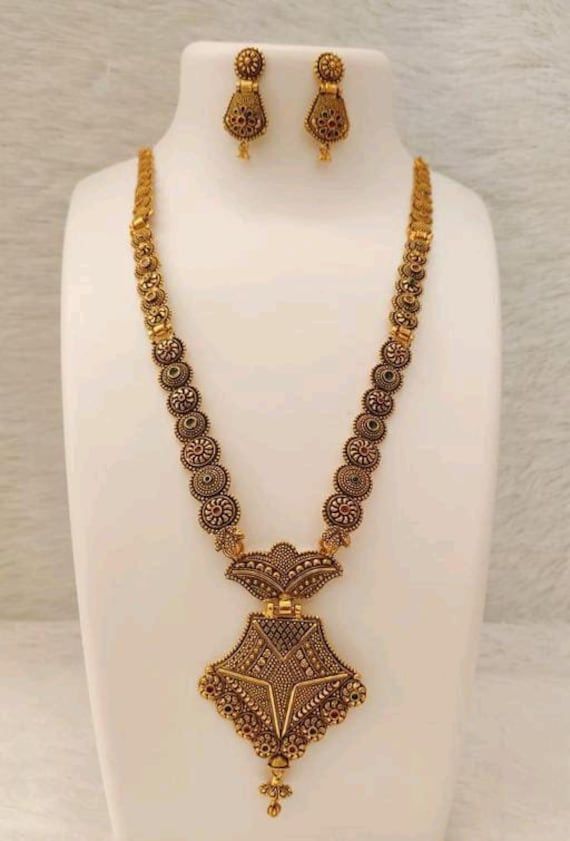 Material:- Alloy, Gold Platted Pack- Necklace Set These Beautiful Gold Platted Necklace Best for gifting and personal use, You can gift your Girlfriend, Mother, Sister , Relatives , Neighbours etc. Combine it with Matching Dress and be the Limelight of every Occasion ( Diwali, Birthday, Anniversary, Christmas, Any Ritual Festival). Suitable for all Occasions. a)These are very skin Friendly. b)The plating is Non- Allergic and safe for all Environment. Gift for Her, Best Friend Gift, Gift Ideas, V Gold Dual-tone Jewelry Sets As Gift, Dual-tone Gold Jewelry Sets For Gifts, Gold Dual-tone Jewelry For Gift, Gold Dual-tone Jewelry Gift, Dual-tone Gold Jewelry For Gift, Metal Jewelry Sets For Festivals As Gifts, Metal Jewelry Sets As Festival Gifts, Metal Jewelry Sets For Festivals And Celebrations, Antique Gold Temple Bridal Necklace As Gift