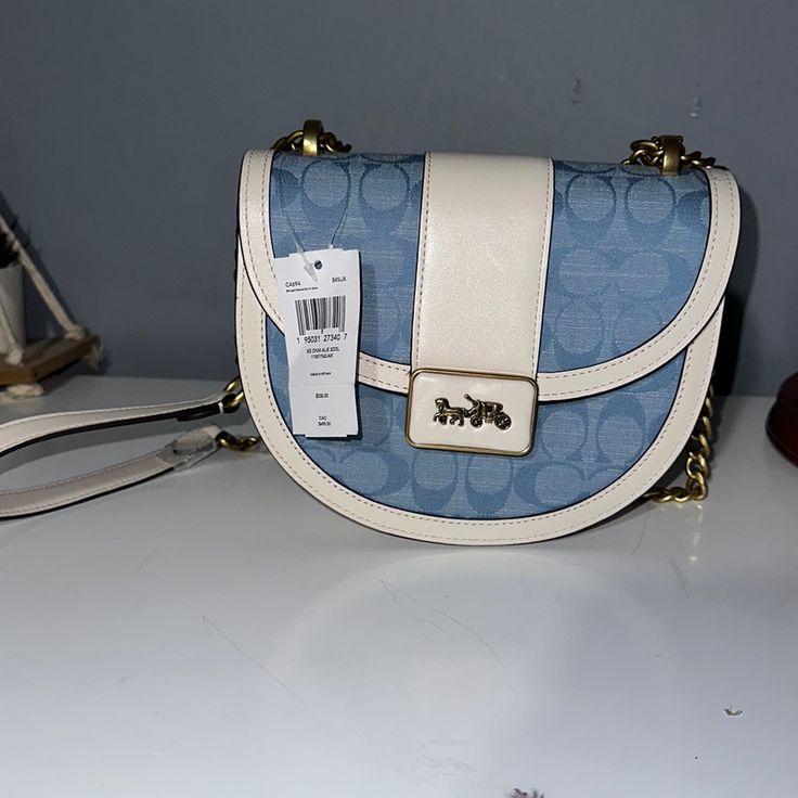 Coach Brand New Light Blue And White. Coach Bucket Bag, Blue Handkerchief, Coach Lights, Coach Crossbody Purse, Large Crossbody Bags, Leather Saddle Bags, Bags Coach, Crossbody Clutch, Leather Crossbody Purse