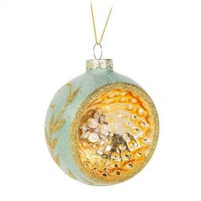 a blue and gold ornament hanging from a string