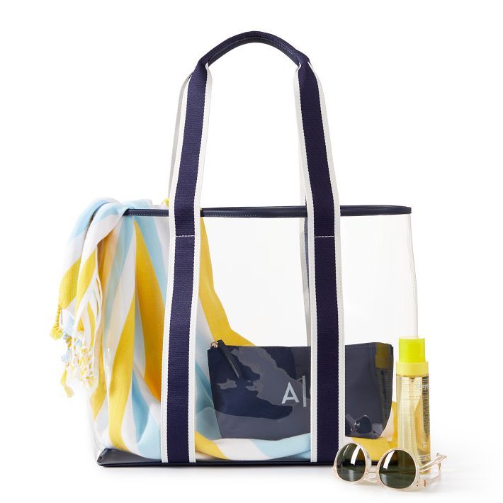 Access all your summer essentials at a glance with this spacious clear tote, designed for everything from beach days and boat days to tennis matches and yoga class. Constructed from sturdy and easy-to-clean plastic and durable nylon, it comes with a coordinating zipper pouch to keep smaller items organized. The see-through construction makes it a great option for stadium events and festivals. Add a monogram to the included pouch for a custom touch.    Set includes a tote and a zipper pouch.  16. Large Capacity Clear Bags For Beach, Casual Clear Beach Bag, Clear Bags For Daily Summer Use, Sporty Nylon Bags For Summer, Clear Bag For Everyday Summer Use, Clear Bag For Everyday Use In Summer, Clear Bags For Everyday Use In Summer, Clear Everyday Bags For Summer, Casual Nylon Beach Bag For Vacation