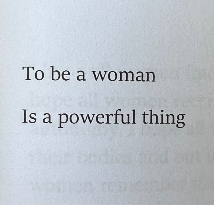 an open book with the words to be a woman is a powerful thing