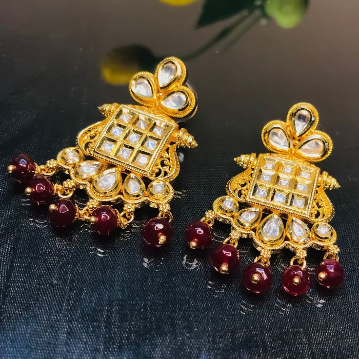 These are a beautiful pair of Earrings, made with beautifully Kundan beaded. These earrings work well with all types of clothing, whether it be formal attire or a casual party. Option 1 : Red Color (E722) Option 2 : White Color (E723) Eye-catching and unique jewellery that will set you apart. Gift this piece to a loved one, and see their face light up with joy. Best for gifting or for personal use, wear it to any occasion and be in the spotlight. Traditional Red Pearl Earrings For Party, Red Chandbali Pearl Earrings For Weddings, Traditional Red Pearl Earrings, Formal Red Kundan Earrings, Ceremonial Ruby Earrings For Diwali, Kids Handicraft, Saree Petticoat, Saree Jewellery, Silver Pooja Items