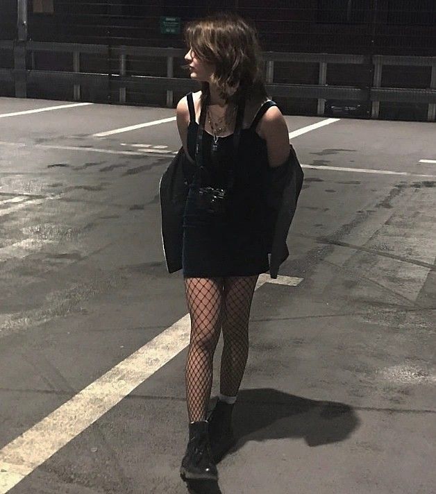 tight dark dress and boots on a roof Club Outfits Fishnets, Grunge Outfits Fishnets, Black Dress And Fishnets Outfit, Summer Fishnet Outfit, Fishnet With Skirt, Fishnets With Skirt, Casual Fishnet Outfit, Fish Net Tights Outfit Dresses, Skirt And Fishnets Outfit