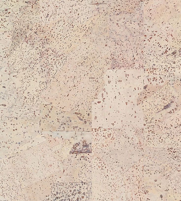 an image of a white and brown floor with spots on it's surface that looks like stone