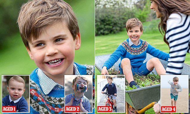 the young boy is smiling and posing for pictures