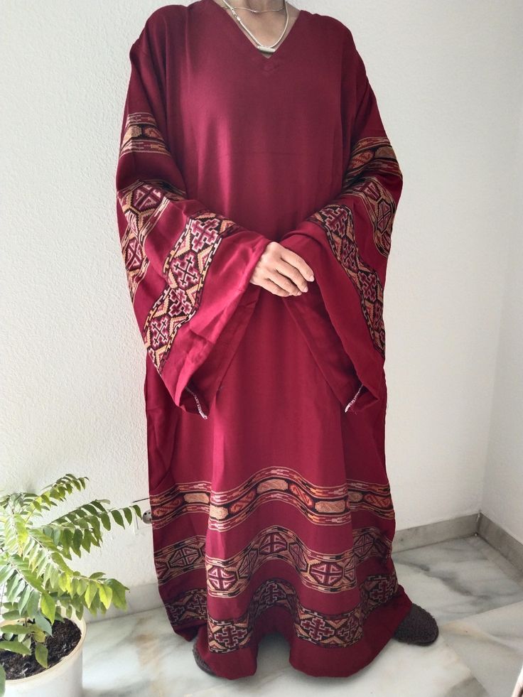 Wool kaftan Red Long Sleeve Abaya With Dabka, Traditional Festive Dress With Cape, Festive Long Sleeve Kaftan, Traditional Fall Festive Kaftan, Traditional Red Winter Dress, Traditional Cape Style Festive Kaftan, Traditional Cape-style Festive Kaftan, Traditional Cape Kaftan For Festive Occasions, Red Long Sleeve Kaftan With Traditional Patterns