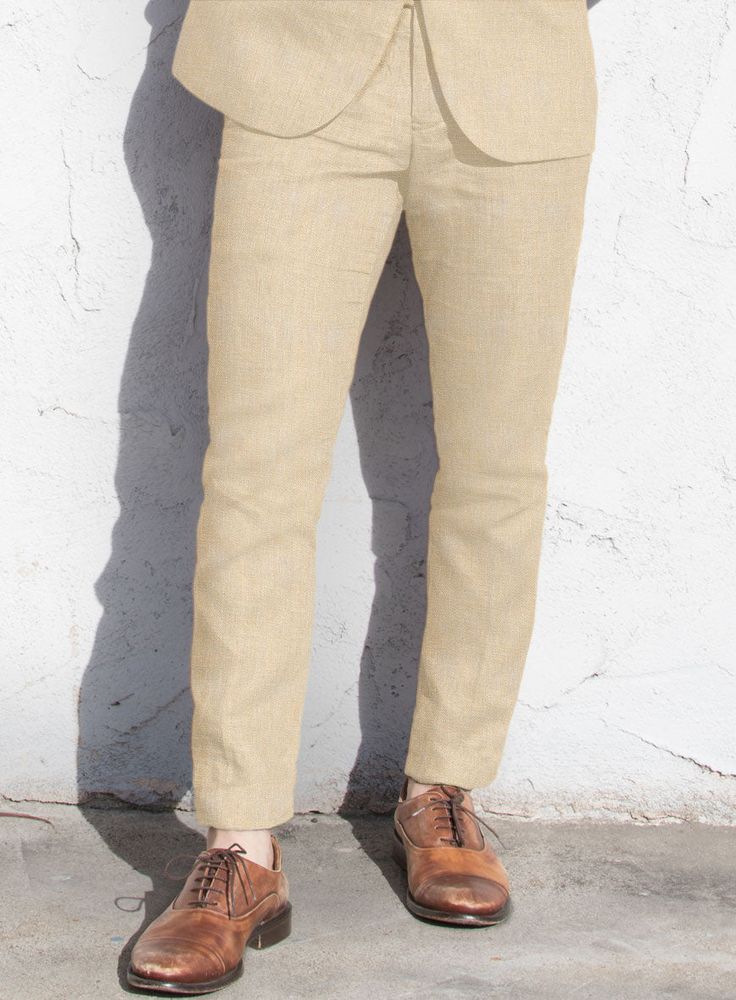 Transform the statement accents by including our Italian Prato Musk Linen Pants. Besides, the pants are crafted from a pure linen material which exudes a plush, soft and exceptionally supple while elevating the breathable character that aims to keep you dry and stylish all summer long. And finally, fulfilling the premium element's commitment with solid musk pants encourages a dapper addition to your timeless wardrobe while flaunting an effortless stunning drape that promises to keep you covered for various occasions.  Look Includes   Italian Prato Musk Linen Fabric  Cross Pocket  Flat Front  Two Welted Back Pockets on Trousers    Click 'Customize Now' to modify the look if needed.   Lining: Viscose; Dry Clean. Beige Linen Suit, Khaki Linen Pants, Beige Linen Pants, Khaki Suit, White Linen Suit, Royal Blue Suit, Italian Shirts, Fabric Cross, Cotton Linen Pants