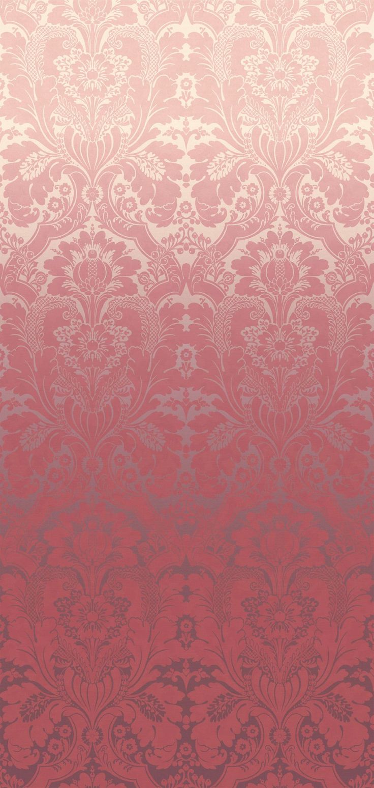 a red and pink wallpaper with an ornate design on it's side,