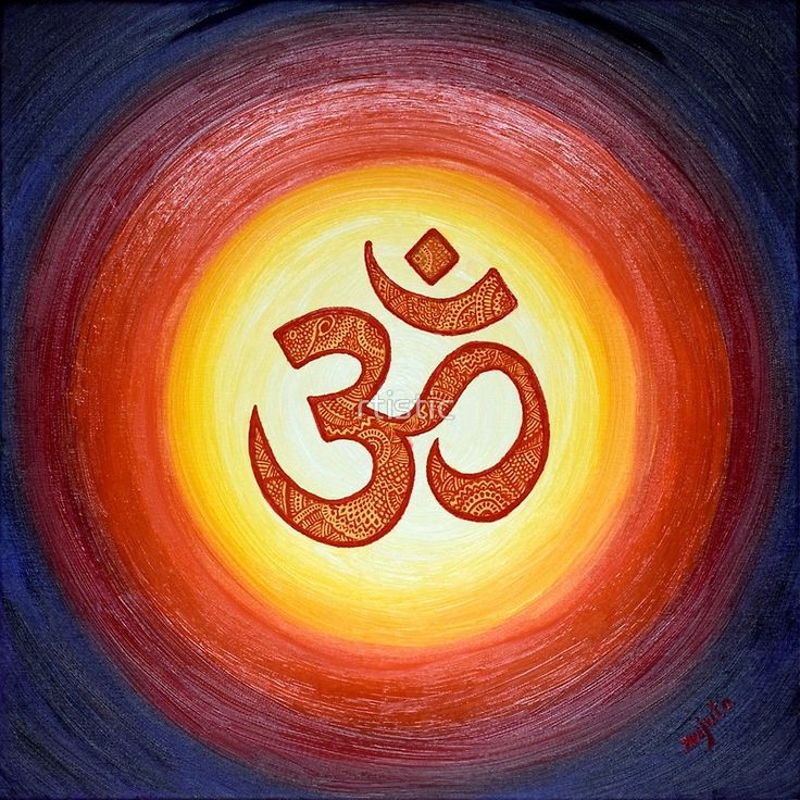 an om manidala painting in red, yellow and blue