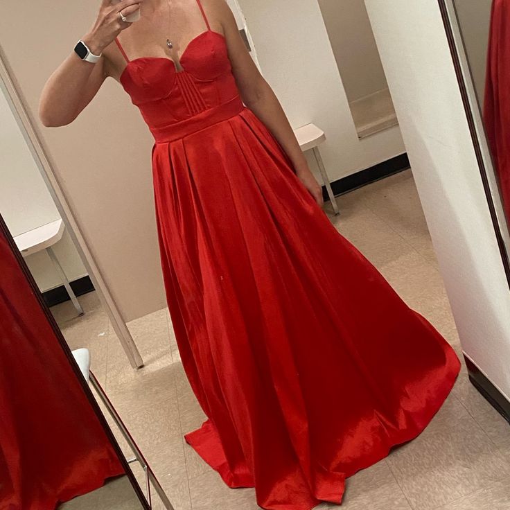 This Gown Is An Absolute Eye Catcher New Without Tags, Was Going To Wear For A Wedding But Decided On Something Different. It Was Final Sale So Couldn’t Return. Normally I’m Size Small/Medium And This Fit Perfect. Has Pockets Too Red Ball Gown Maxi Dress For Gala, Red Carpet Satin Gown With Fitted Bodice, Elegant Red Evening Dress With Corset Back, Red Ball Gown For Formal Occasions, Fitted Ball Gown Dress For Red Carpet, Red Evening Dress With Corset Back For Formal Events, Red Dress With Lined Bodice For Prom Season, Red Gown With Corset Back For Formal Occasions, Red Ball Gown Maxi Dress For Prom Season