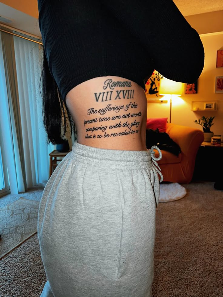 a woman with a tattoo on her stomach that says, i am not the only one who