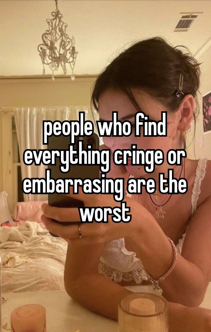 a woman sitting at a table looking at her cell phone with the caption people who find everything cringe or embarrasing are the worst