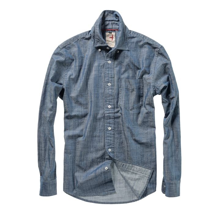 A breathable twill shirt with a denim twist Light Indigo Cotton Shirt For Fall, Light Indigo Cotton Tops With Button Closure, Unstructured Indigo Button-up Shirt, Classic Fitted Shirt In Medium Wash, Classic Fitted Medium Wash Shirt, Unstructured Button-up Denim Blue Top, Unstructured Denim Blue Button-up Top, Unstructured Dark Wash Cotton Shirt, Unstructured Cotton Shirt In Dark Wash