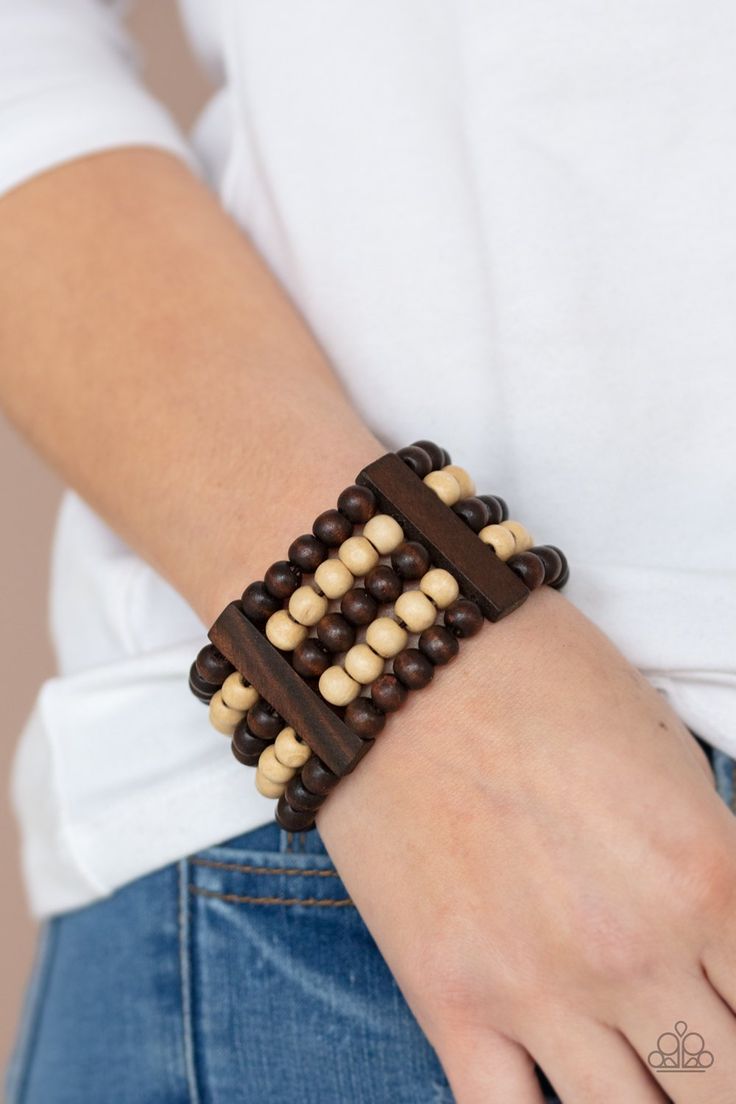 Held in place by rectangular wooden frames, strands of brown and white wooden beads are threaded along stretchy bands around the wrist for a colorfully tropical look. Sold as one individual bracelet. P9SE-BNXX-173XX Casual Brown Beaded Bracelets For Vacation, Casual Brown Wooden Bead Bracelets, Brown Stretch Bracelet With Wooden Beads, Adjustable Brown Wristband With 8mm Beads, Orange Order, Wood Beads Jewelry, Black Multi-strand Wooden Beads Jewelry, Paparazzi Jewelry Images, Paparazzi Accessories Jewelry