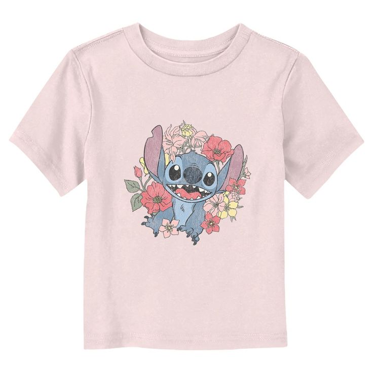 Ohana means family, and family means no tee gets left behind! Find the perfect style for your little one with this officially licensed Toddlers' Disney Lilo & Stitch Floral Alien Graphic T-Shirt! This fun design features a cute, distressed design of Stitch surrounded by beautiful colorful flowers that he found for you across the front. Celebrate a certain alien, otherwise known as Experiment 626 with new fabulous apparel from the incredible movie! Animated Clothes, The Young Ones, Ohana Means Family, Disney Lilo, Graphic Tee Design, Trendy Kids, Couple T-shirt, Toddler Boy Outfits, Top Graphic Tees