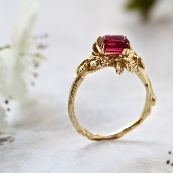 FREE SHIPPING WORLDWIDE.Gold filled ring with fuchsia CZ stone.After many years of rumors, the treasure of precious stones was found. Precious stones from faraway lands with love for bold colors.The treasure was located within a raspberry bush in the secret garden.The Secret Garden collection is inspired by the living sculptures designed and created by nature. All of the jewelry is personally designed and sculpted by hand in stunning details by Noga Berger.This ring is for women with strong love Unique Hallmarked Ruby Ring Gift, Unique Hallmarked Ruby Ring As A Gift, Unique Gemstone Promise Rings, Heirloom Emerald Cut Ruby Ring Gift, Unique Gift Ruby Ring With Stone Setting, Emerald Cut Hallmarked Ruby Ring For Gift, Unique Ruby Ring With Stone Setting As Gift, Unique Ruby Birthstone Ring Gift, Handmade Emerald-cut Wedding Rings