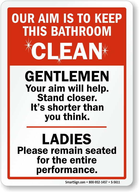 a red and white sign that says, our aim is to keep this bathroom clean