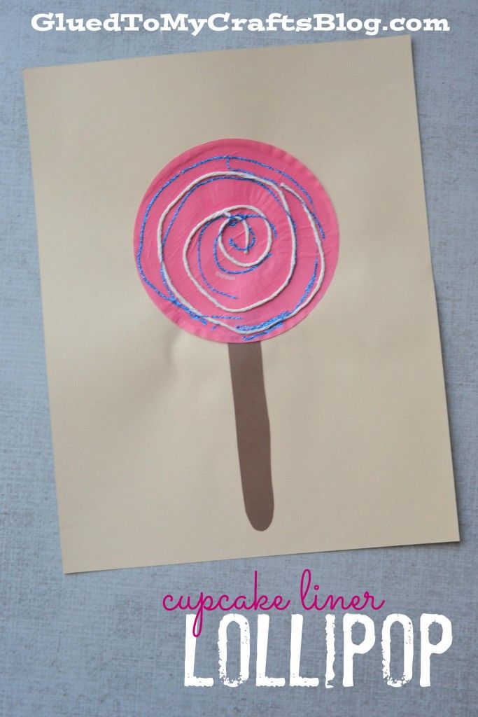 a lollipop made out of paper on top of a piece of paper