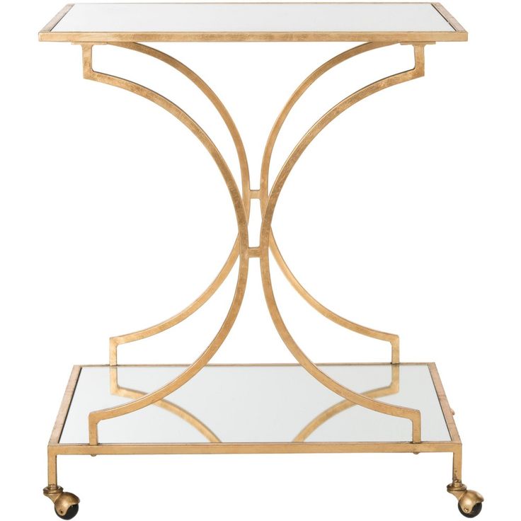 a gold metal and glass side table with wheels on the bottom, against a white background