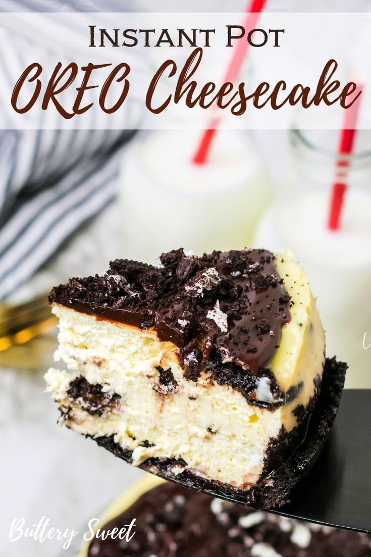 a piece of cheesecake with chocolate and oreo crust on it, sitting next to a glass of milk