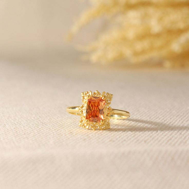 Orange Topaz Ring Gold 14k Gold Vintage Topaz Ring Gold Genuine Topaz Vintage Style Ring designed by ISEA Fine Jewelry can be a good choice as an engagement ring and a perfect birthday, anniversary gift. ➤ Ring Details * 14k / 18k Yellow Gold or Yellow Sterling Silver * Gold Color Options; 14K / 18k White, Yellow, Rose Gold * Band Width: 1.70 mm * Thickness: 1.30 mm ➤ Gem Details * Gemstone : Orange Topaz * Gem width: 5 millimeter * Gem length: 7 millimeter * Cut Type: Emerald * Ready to Ship 3-