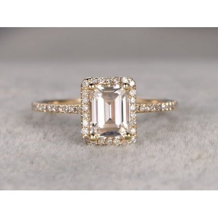 Best Emerald Cut Moissanite is made of 1.25 Ct Halo Moissanite & Moissanite Diamond Wedding Ring in 925 Silver with Rose Gold Plating. The crafted in superb semi-eternity style ring has .25 carat of real natural Moissanite Diamonds. The center stone is of 1.25 carats of real Moissanite. Lets feature this ring in the engagement ring trends of 2019. Size: 5.0.  Color: Yellow.  Gender: female.  Age Group: adult. Diamond Ring With Emerald, Best Wedding Rings, Ring With Emerald, Ring Cuts, Emerald Cut Engagement Ring, Future Engagement Rings, Trending Engagement Rings, Gorgeous Rings, Emerald Cut Engagement