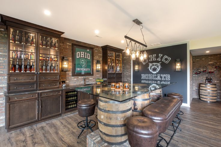 a bar with several stools in front of it