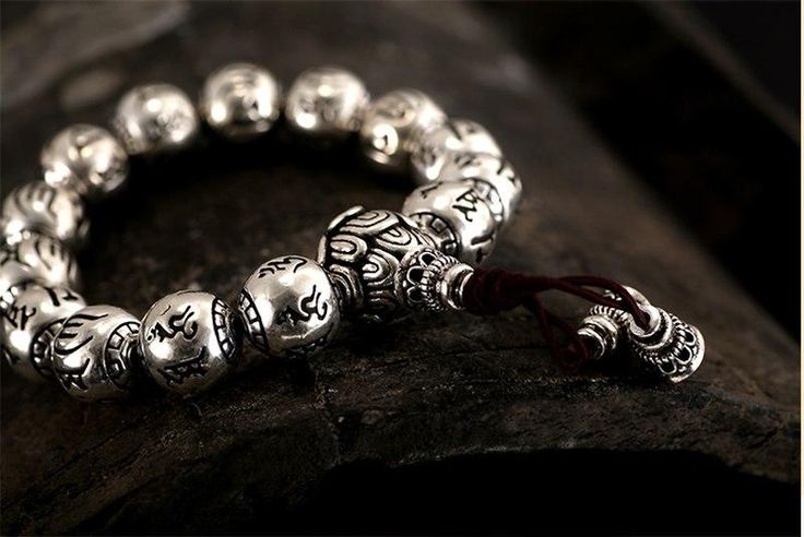 Made from premium quality 990 fine silver, this casual occasion Solid S990 Silver Round Bead Buddhist Bracelet ensures great comfort all day long. The fabulous looking silver bracelet features a striking design along with intricately carved mantra detailing. Choose this bracelet to add vogue to your attire or to prove your style statement.SpecificationsBrand Name: GeraldBlackBracelets Type: Strand BraceletsMetals Type: Thai SilverGender: UnisexClasp Type: Lace-upStyle: VintageMaterial: MetalSett Buddhist Bracelet, Prayer Bracelet, Style Statement, Fine Silver, Silver Bracelets, Round Beads, Mantra, Chain Link, Silver Bracelet