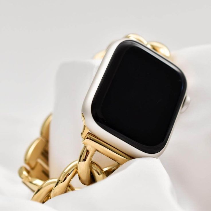 Meet your new favourite watch band. Perfect to add a touch of luxe to any outfit, wear it on repeat to the office, bar and everywhere in between. Crafted from premium stainless steel and plated in 18k Gold to elevate your Apple Watch into a piece of fine jewellery. Our commitment to high quality ensures your bracelet is: Waterproof Rust Free Tarnish Free Nickel Free Plating Need to shorten your band for a firmer fit? Simply flick open & remove the clasp links with your nail - no tool required! O Elegant Gold Stainless Steel Watch Accessories, Gold Stainless Steel Chain Watch, Elegant Yellow Gold Stainless Steel Watch Accessories, Modern Yellow Gold Metal Watches, Timeless Gold Rectangular Watch Bands, Modern Metal Watch Chain Accessory, Elegant Gold Stainless Steel Apple Watch Band, Modern Stainless Steel Watch Accessories For Gifts, Modern Metal Watch Chain