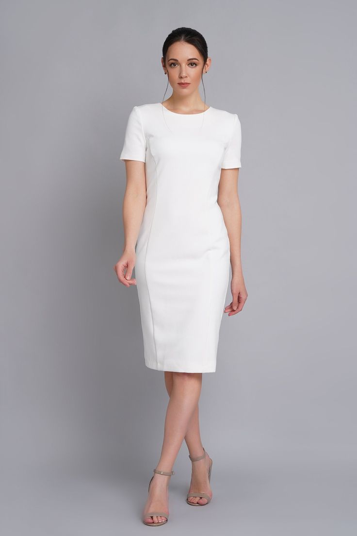 A minimalist dress featuring pencil silhouette, short sleeves, and a midi length. - scoop neck - fitted sheath silhouette - short sleeves - princess seams - midi length - concealed back zipper closure - fully lined The outer fabric : 40% viscose, 55% polyester, 5% elastane. The lining : 57% Viskose, 35% polyester, 8% elastane. Care: cold hand wash with similar colour. Please choose from our measurements chart your dress size, or write us your body measurements, we then select the right size for Classic Short Sleeve Midi Dress For Wedding, White Short Sleeve Formal Midi Dress, Elegant White Fitted Short Sleeve Dress, White Fitted Short Sleeve Elegant Dress, White Short Sleeve Midi Dress For Formal Occasions, White Bodycon Short Sleeve Dress, Classic Bodycon Short Sleeve Midi Dress, Classic Bodycon Midi Dress With Short Sleeves, Elegant White Cap Sleeve Dress