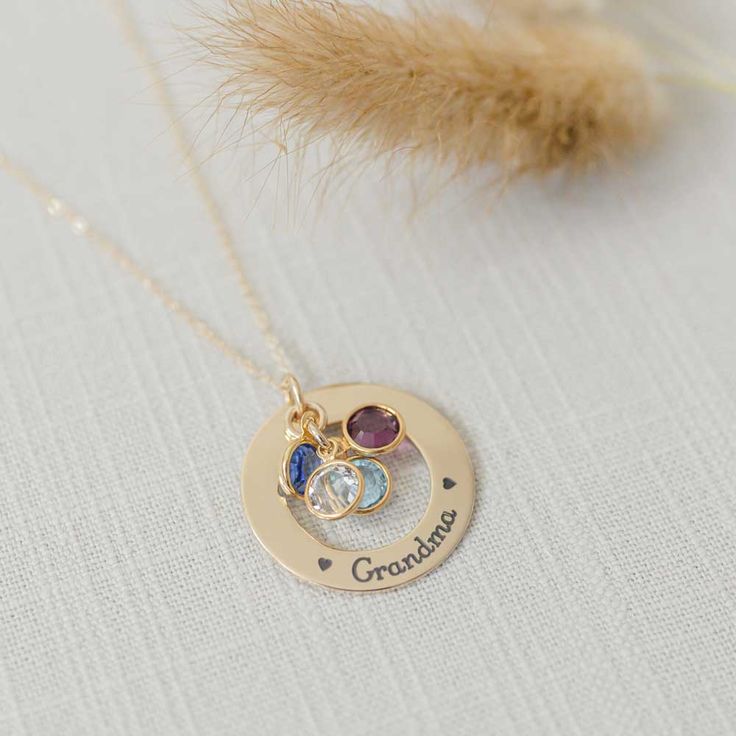 A beautiful golden gift for your Grandma or Mom. What better way to remind her of her family - a necklace personalized with names and birthstones representing each grandchild Product details MATERIAL: 14K Gold Pendant, Plated or Gold Filled ChainSIZE: 1 1/8" (28.575) pendantCHAIN LENGHT: 16", 18", 20" based on selectionCHAIN STYLE: cable, curb, rolo, double ropeBIRTHSTONES: Optional based on selectionENGRAVING: Up to 5 characters (including spaces) around the circumference of the washer Engraved Mother's Day 14k Gold Birthstone Charm Necklace, Anniversary Birthstone Charm Necklace, Personalized 14k Gold Birthstone Necklace Gift, Yellow Gold Birthstone Charm Necklace For Mom, Gold Sterling Silver Birthstone Necklace For Birthday, Gold-colored Sterling Silver Birthstone Necklace For Birthday, Mother's Day Birthstone Necklace Personalized Gift, Personalized Yellow Gold Birthstone Necklace For Gift, Personalized 14k Gold Name Necklace With Birthstone